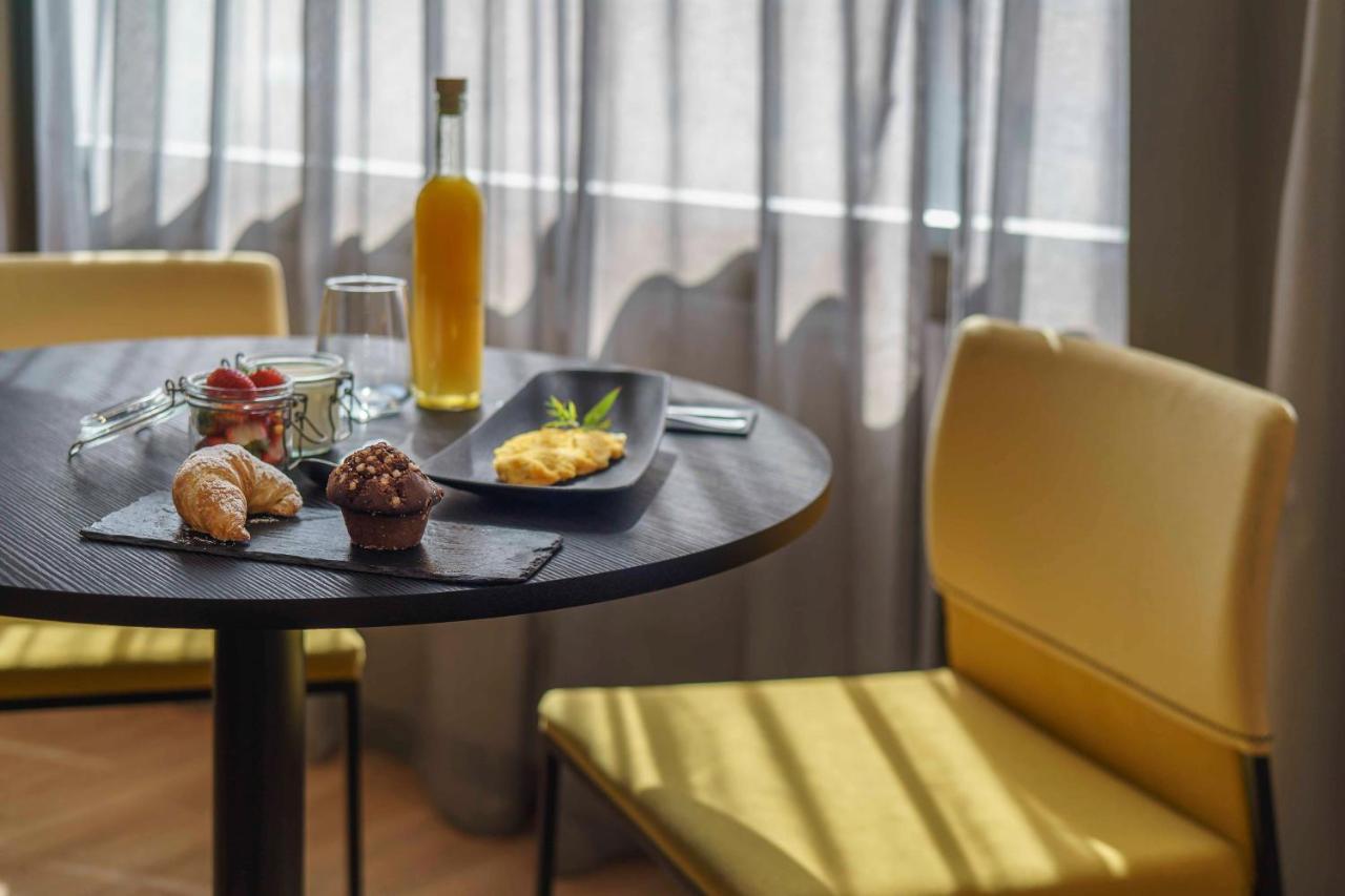 מלון Pullman Santiago El Bosque מראה חיצוני תמונה A room at the hotel